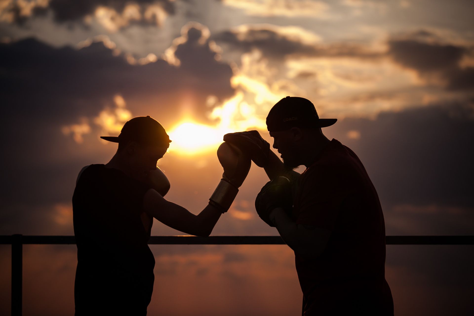 Man in Black Boxing Gloves